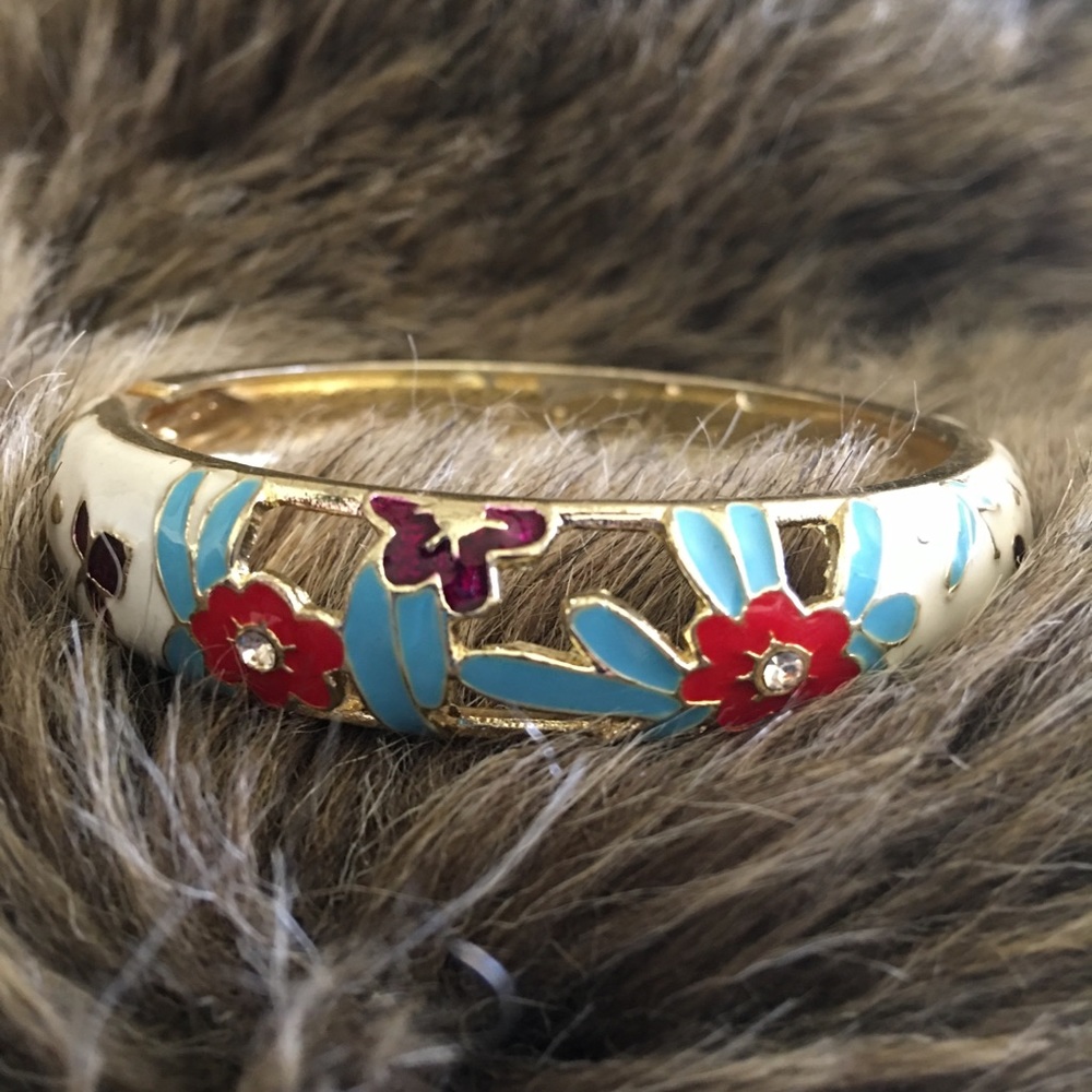 Gold tone floral enamel and rhinestone bracelet